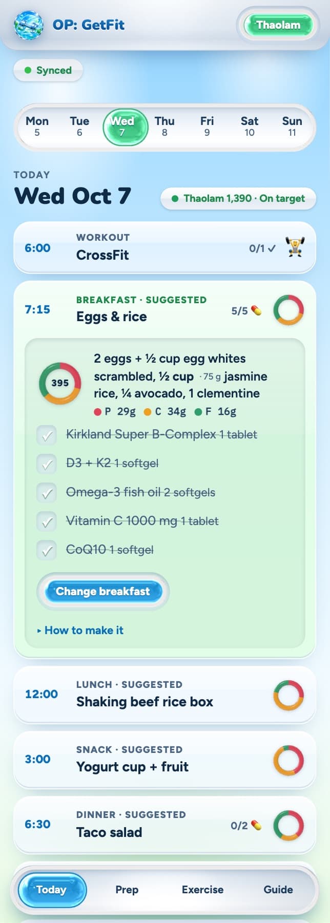 Today on a phone: the day rail, today's CrossFit workout, and breakfast opened to her exact portion, macros and the vitamins to take with it